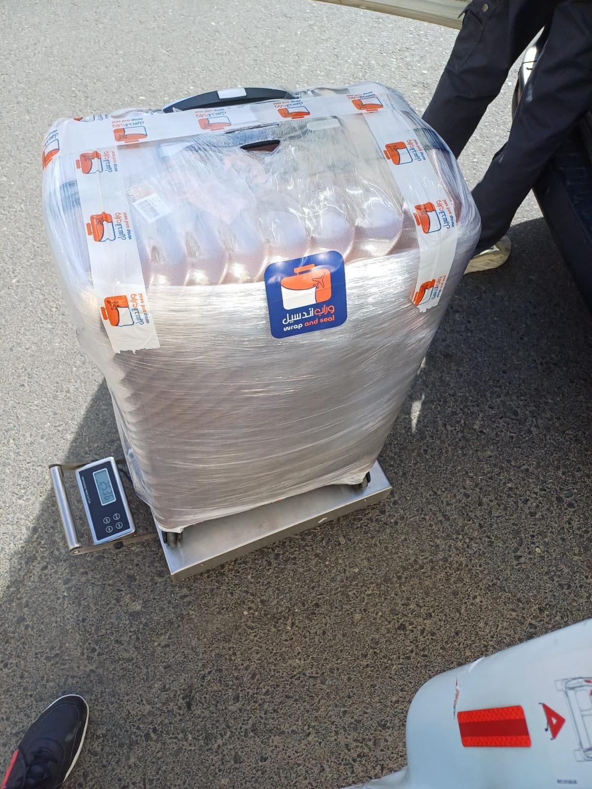 Luggage being weighed